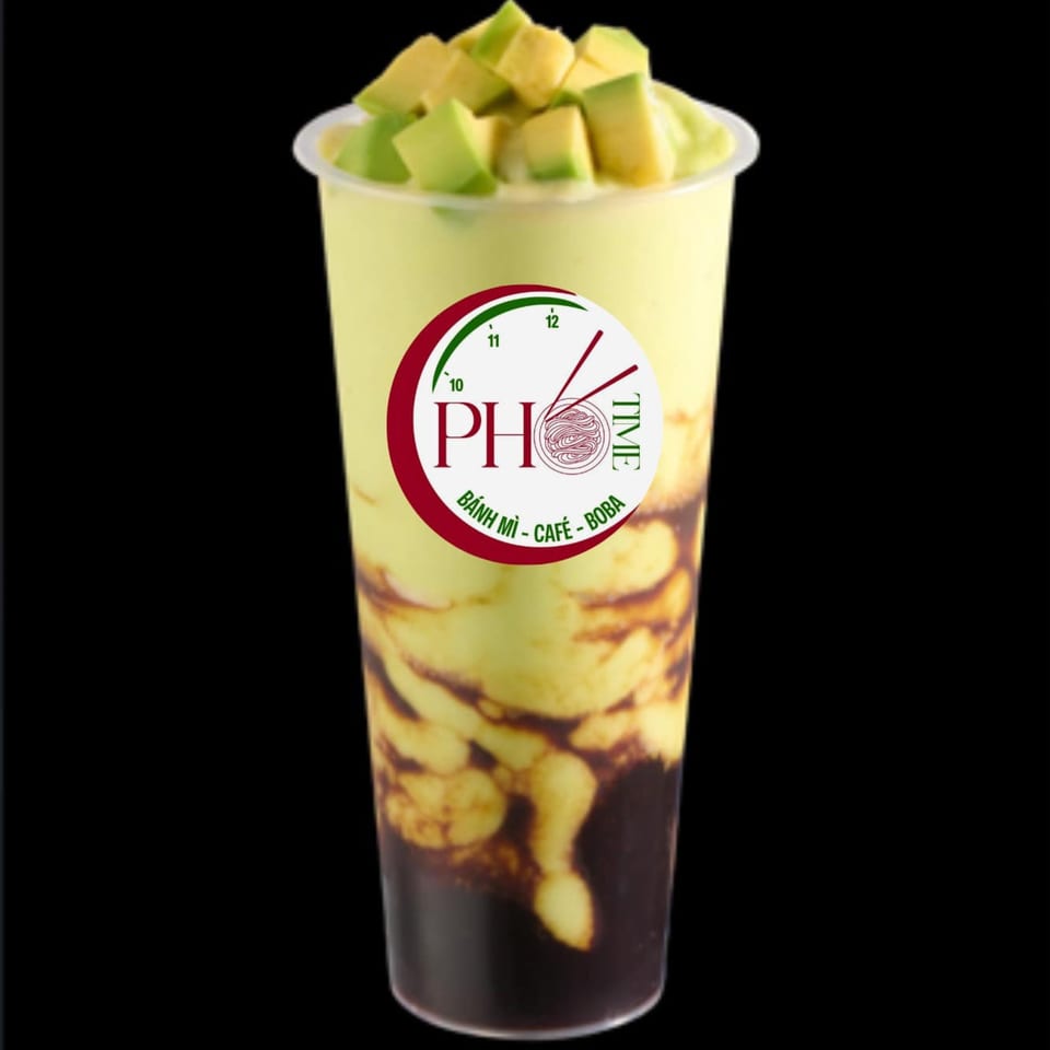 Pho Time's avocado smoothie with dark syrup swirls and fresh avocado chunks on top.