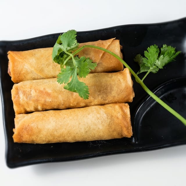 A2. Egg Rolls (Chicken or Veggies) (3).